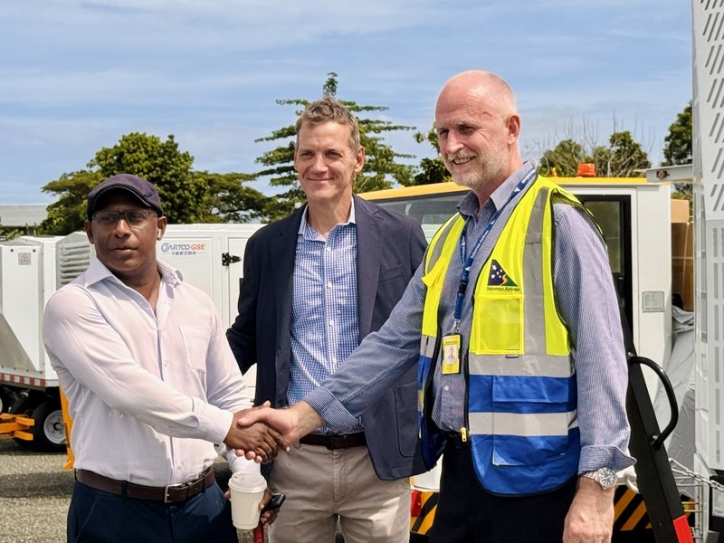 MCA Rep shaking hands with SAL CEO